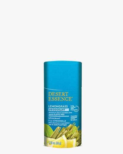 Lemongrass Deodorant in a bright turquoise eco-friendly paperboard tube with Desert Essence branding, featuring fresh lemongrass imagery in vibrant yellow and green against a white background.