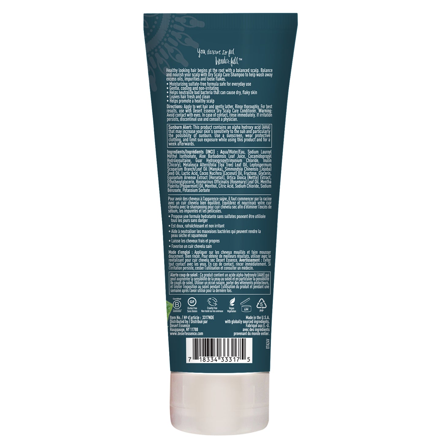 back of grey dry scalp care shampoo bottle showing what this product does, sunburn alert message and the ingredients in the bottle.