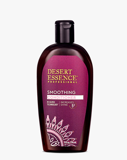 Desert Essence Professional Smoothing Hair Conditioner in a dark brown bottle with purple label featuring decorative mandala design. Hi-Gloss Technology formula promises 5X shine increase.