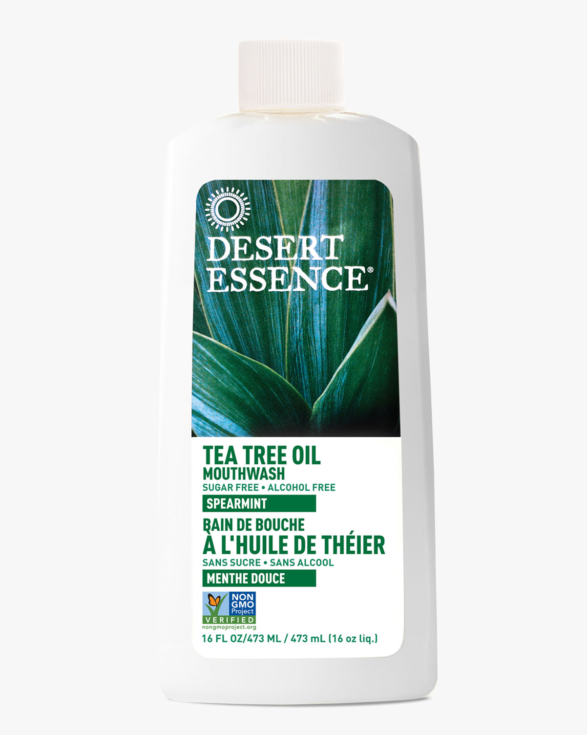 Desert Essence Tea Tree Oil Mouthwash with Spearmint, 16 fl oz bottle featuring a green leaf background design, white plastic container with green and black text labeling, sugar-free and alcohol-free natural oral care product