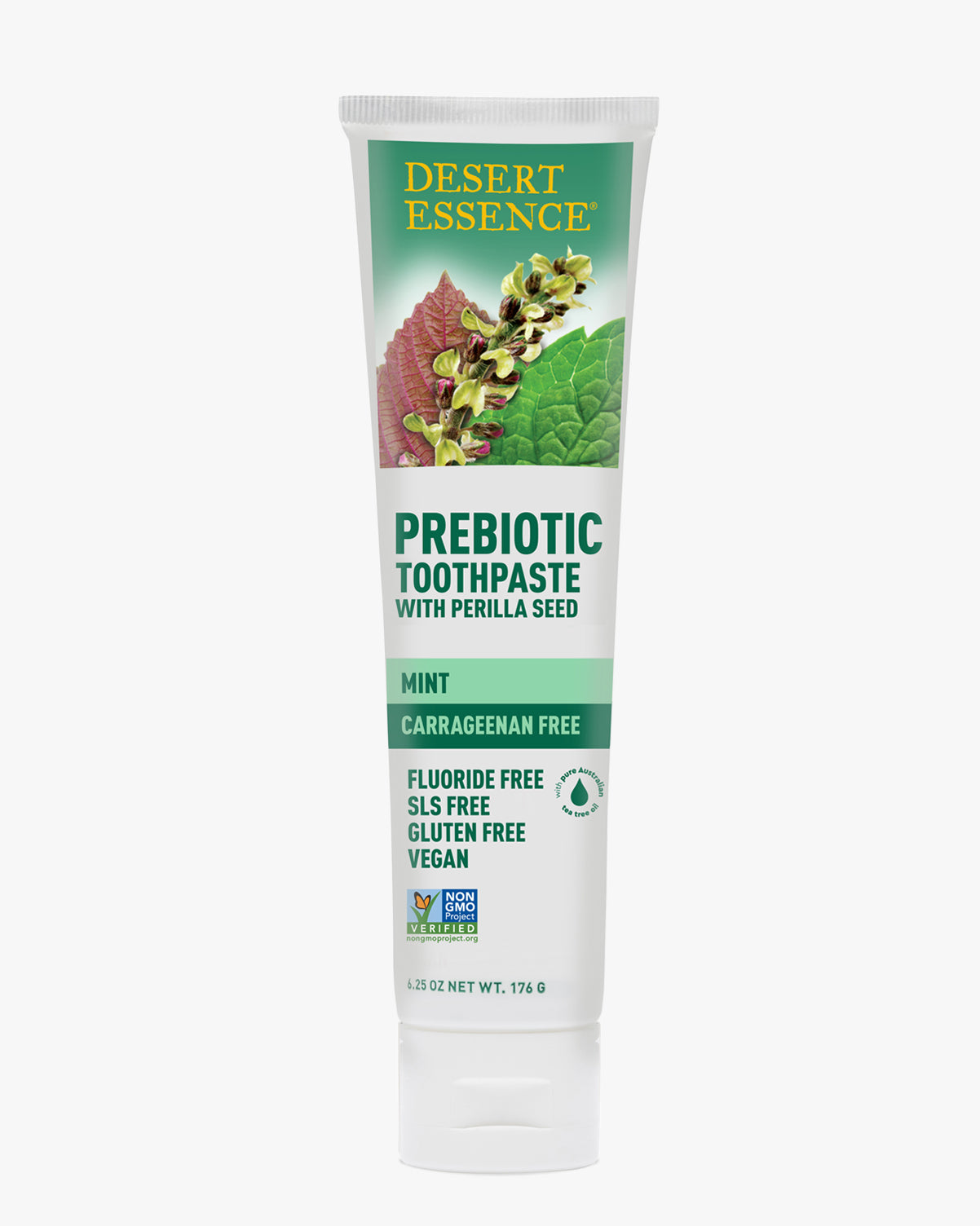 Desert Essence Prebiotic Toothpaste - Mint in a white tube with green accents, featuring botanical leaf imagery and clear labeling showing it's carrageenan-free, fluoride-free, and vegan. The packaging displays perilla seed and natural ingredients for oral care.