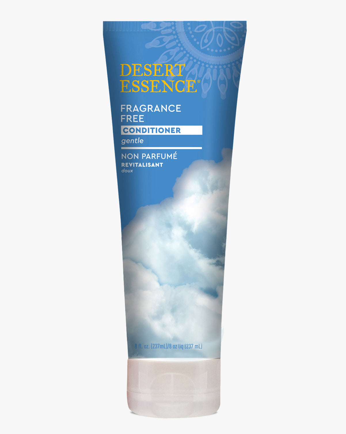 Desert Essence Fragrance-Free Hair Conditioner tube with gentle formula, featuring a serene blue sky and cloud design on a light blue background. The bottle displays bilingual text and a mandala pattern detail at the top.