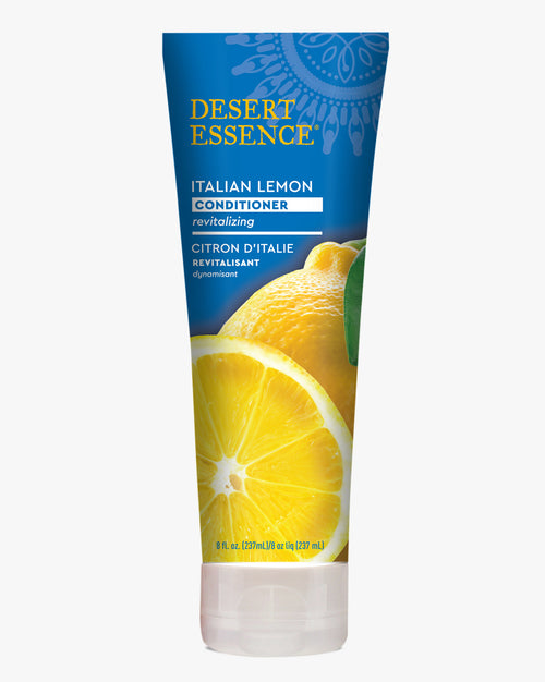 Desert Essence Italian Lemon Conditioner bottle featuring vibrant yellow lemon slice on blue packaging, displaying both English and French text for this revitalizing hair care product