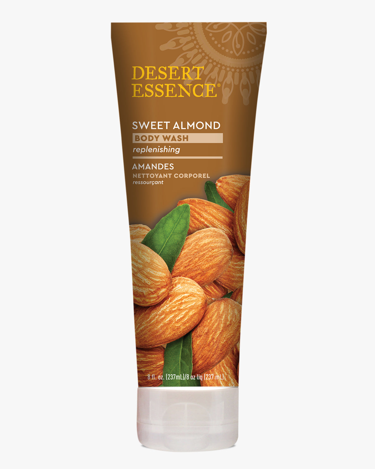 Desert Essence Sweet Almond Body Wash bottle featuring fresh almonds and green leaves on brown packaging, with gold text and French translation. Clear plastic tube container with flip cap for natural organic skincare.