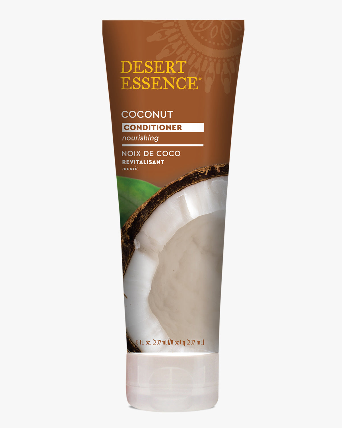 Desert Essence Coconut Conditioner in a white squeeze tube with brown packaging design, featuring a fresh coconut image. The nourishing hair product shows English and French text on a clean, professional design against a white background.