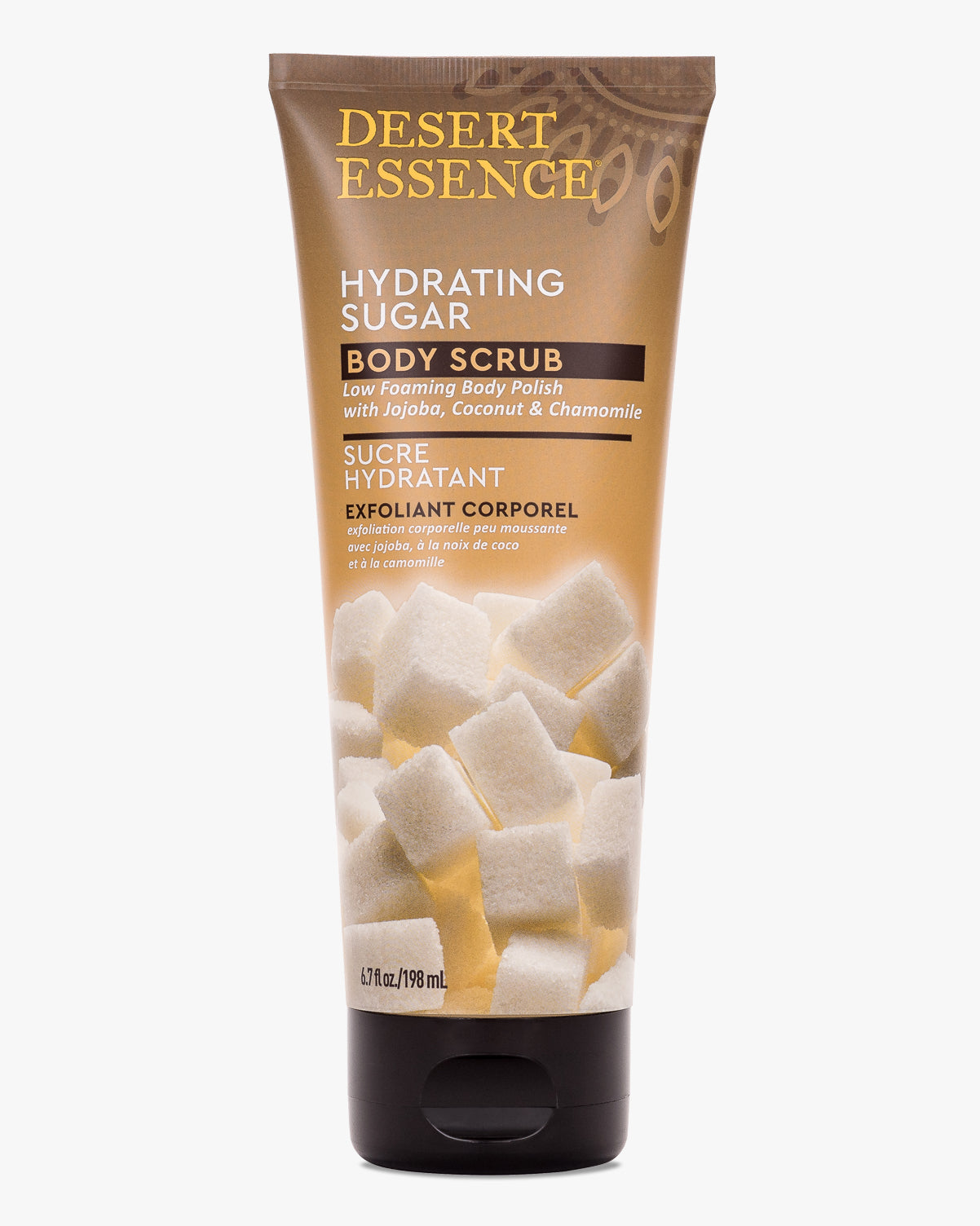 Desert Essence Hydrating Sugar Body Scrub tube featuring sugar cubes against a warm brown background. Natural exfoliating cleanser with chamomile and jojoba oil in brown packaging with gold lettering.