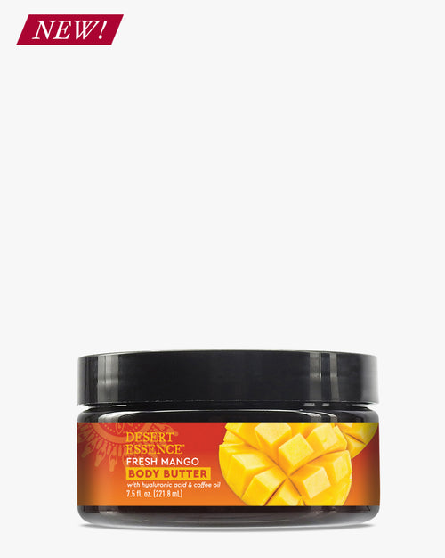 Fresh Mango Body Butter in a black jar with vibrant orange label featuring ripe mango slices, showcasing a luxurious moisturizing cream enriched with hyaluronic acid and natural mango butter for deep skin hydration