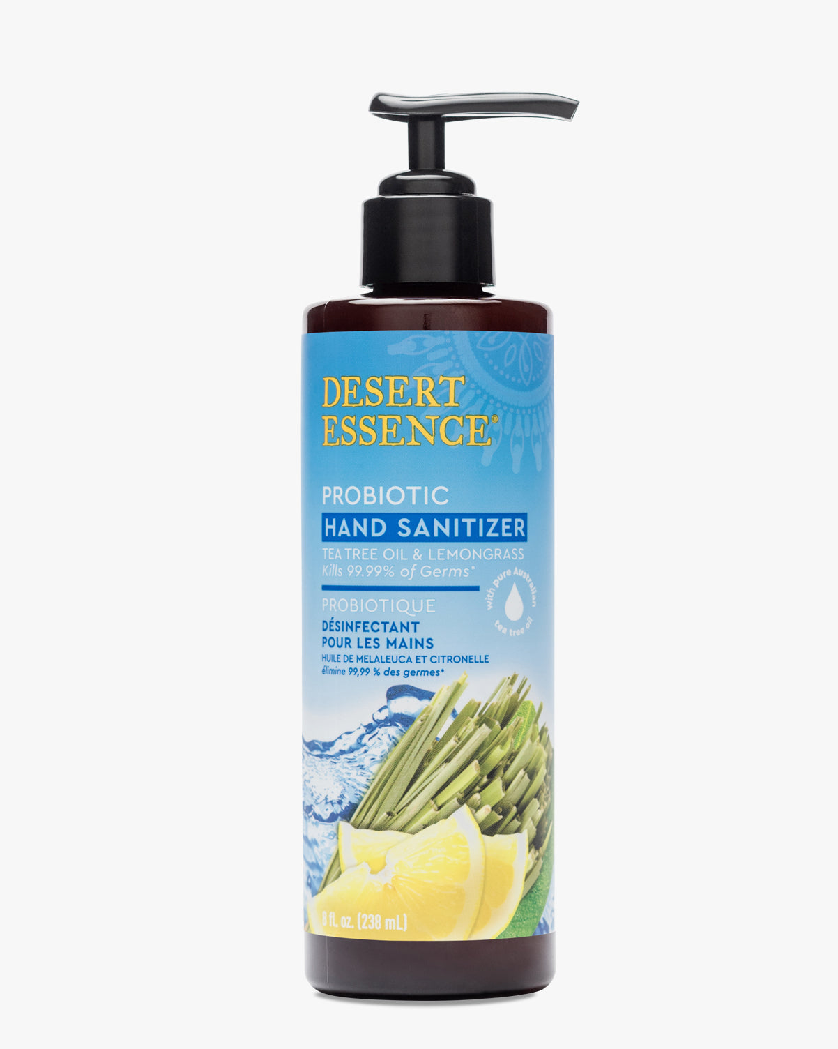 Desert Essence Lemongrass & Tea Tree Oil Probiotic Hand Sanitizer in a dark brown pump bottle with blue label featuring fresh lemongrass and citrus imagery, designed to kill 99.9% of germs while delivering probiotic benefits