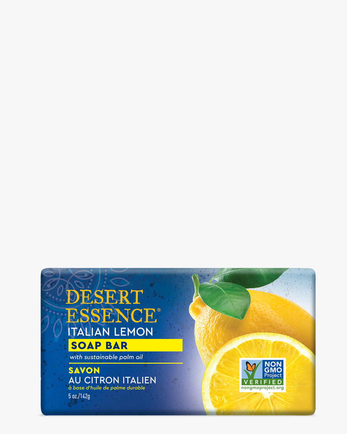 Exfoliating Italian Lemon Soap Bar packaging showing bright yellow lemon with green leaves against blue background, featuring Desert Essence branding and Non-GMO Verified label. Natural soap bar with sustainable palm oil for gentle exfoliation.