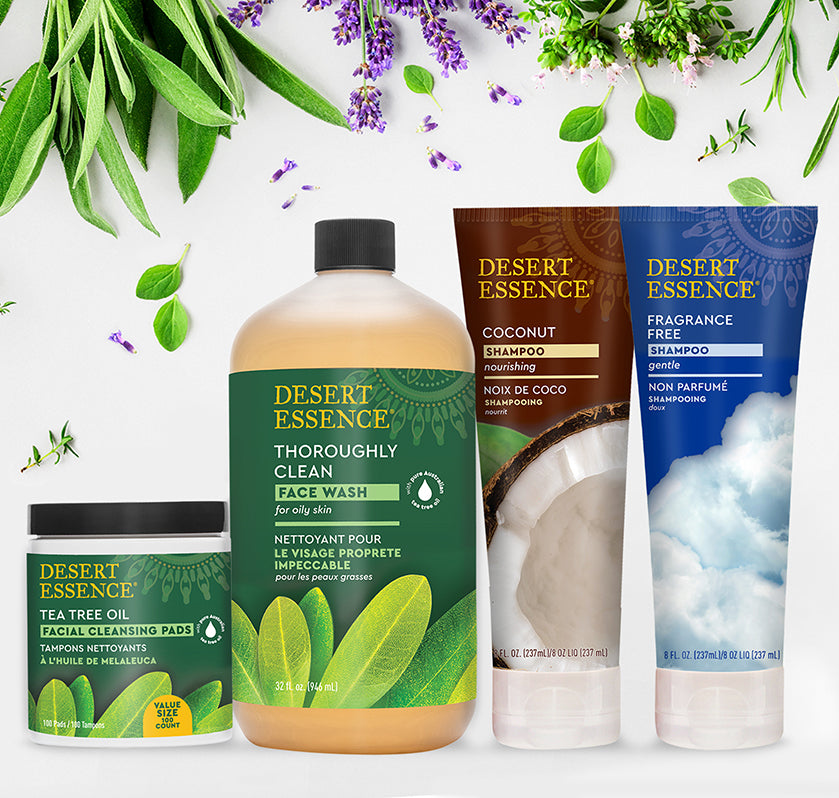 spring image with flowers featuring tea tree oil cleansing pads, thoroughly clean face wash and coconut shampoo and fragrance free shampoo