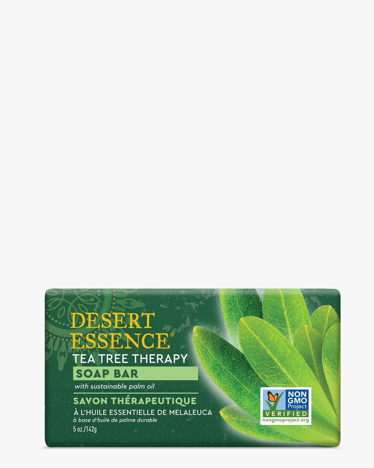 Tea Tree Oil Therapy Cleansing Soap Bar by Desert Essence with green tea leaf packaging design, featuring sustainably sourced palm oil and non-GMO certification label on an emerald green background.